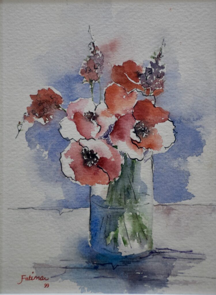 Poppies in a Blue Glass